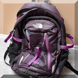 L09. Purple The North Face backpack.  